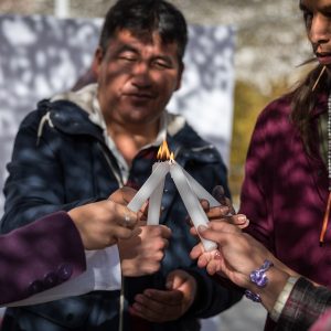 7 December 2019, Madrid, Spain: A group light candles together, as people of faith gather in a 'Prayer for the Rainforest' as part of the Cumbre Social por el Clima, on the fringes of COP25 in Madrid, where faith-based organizations continue to urge decision-makers to take action for climate justice.
